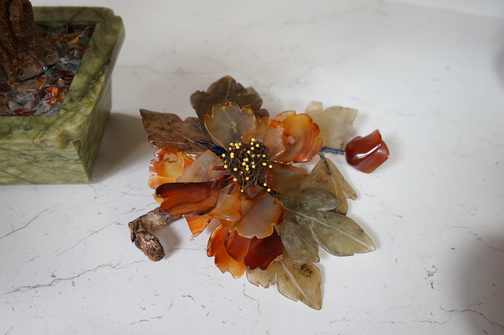A Chinese carved hardstone and semi-precious stone plant, 44cm high